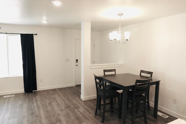 54 N Heading Row, Saratoga Springs, UT 84045 - dining area featuring dark hardwood / wood-style floors and a notable chandelier