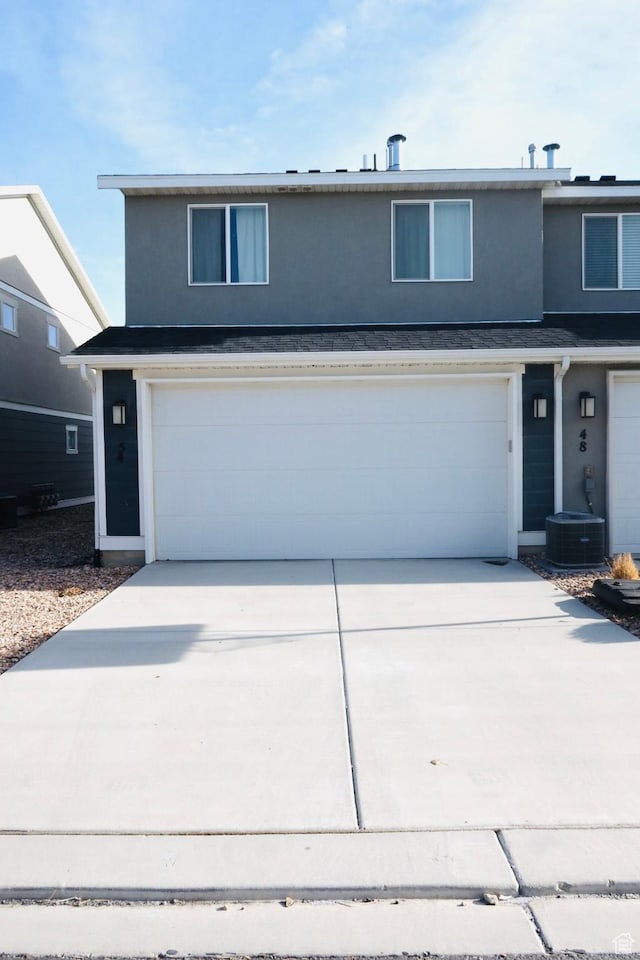 54 N Heading Row, Saratoga Springs, UT 84045 - view of property featuring a garage