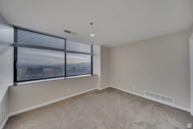44 W 300 S Unit 2306S, Salt Lake City, UT 84101 - spare room with light colored carpet