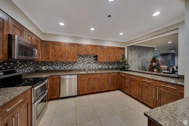 44 W 300 S Unit 2306S, Salt Lake City, UT 84101 - kitchen with stone counters, sink, backsplash, light tile patterned floors, and appliances with stainless steel finishes