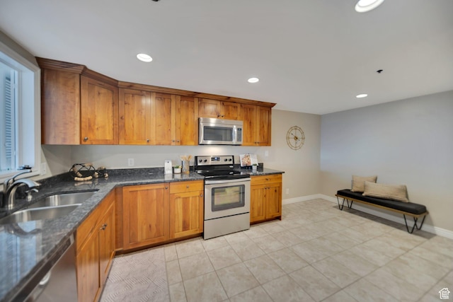 44 W 300 S Unit 2306S, Salt Lake City, UT 84101 - kitchen with light tile patterned flooring, sink, appliances with stainless steel finishes, and dark stone counters