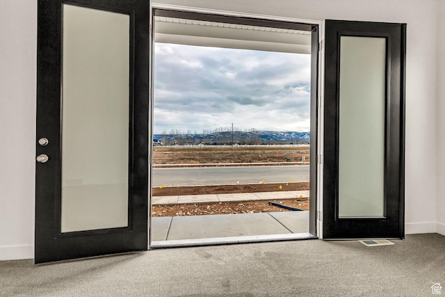 1854 S 1160 E Unit 406, Heber City, UT 84032 - entryway featuring carpet flooring, a mountain view, and french doors