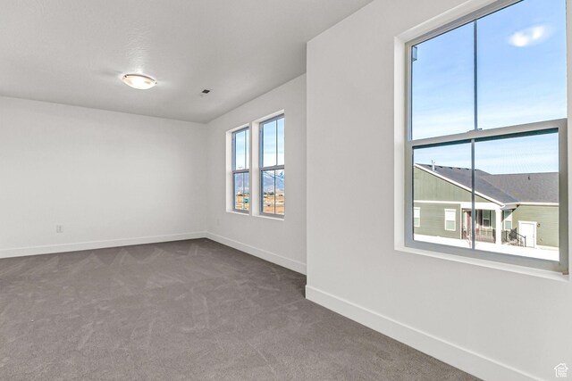 1056 E 1930 S Unit 420, Heber City, UT 84032 - unfurnished room featuring dark carpet and baseboards