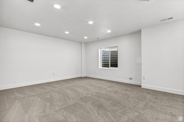 1056 E 1930 S Unit 420, Heber City, UT 84032 - unfurnished room featuring carpet floors, recessed lighting, and a textured ceiling