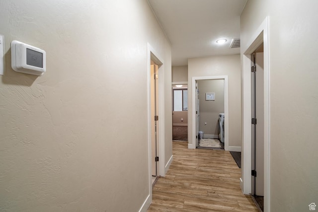 443 N Puerta Dr, Washington, UT 84780 - hallway with light hardwood / wood-style floors