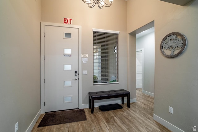 443 N Puerta Dr, Washington, UT 84780 - foyer with a notable chandelier and light wood-type flooring