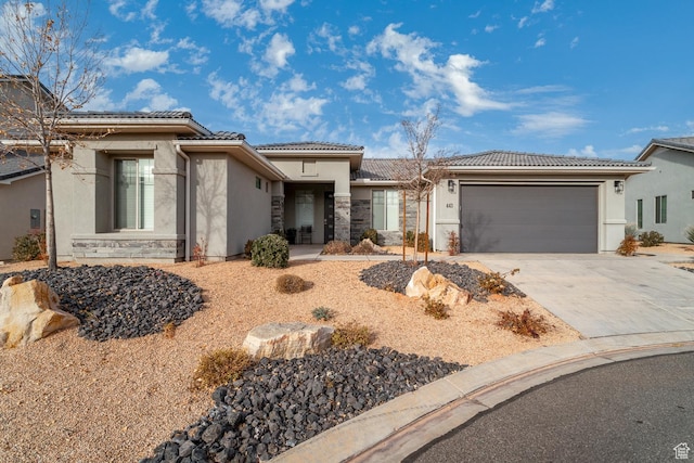 443 N Puerta Dr, Washington, UT 84780 - view of front of home featuring a garage