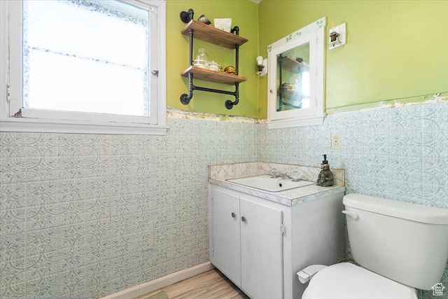 38 S State St W, Fairview, UT 84629 - bathroom featuring toilet, a wealth of natural light, and tile walls