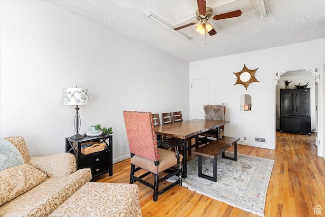 38 S State St W, Fairview, UT 84629 - dining area featuring ceiling fan, wood-type flooring, and a textured ceiling