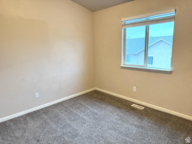 empty room with carpet floors