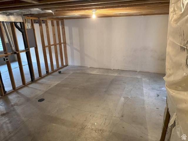 basement featuring electric panel