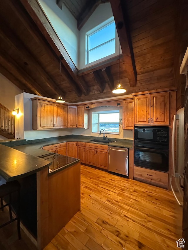 kitchen featuring black appliances, beam ceiling, wooden ceiling, and sink