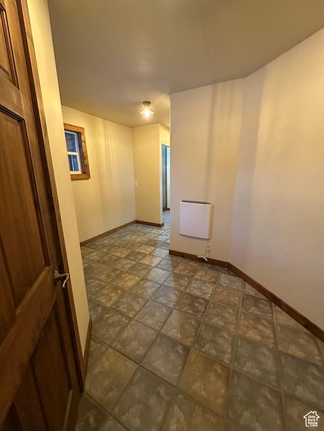 unfurnished room with radiator