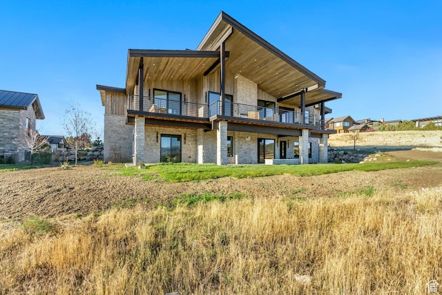2072 E Copper Belt Dr, Heber City, UT 84032 - rear view of house with a lawn and a balcony
