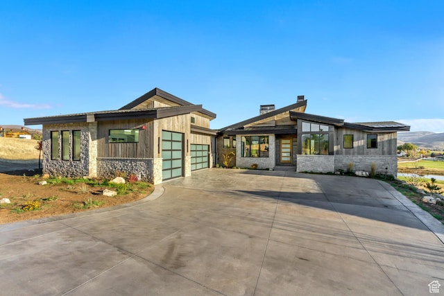 2072 E Copper Belt Dr, Heber City, UT 84032 - modern home featuring a mountain view and a garage
