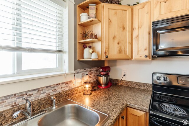 2814 S 1150 W, Nibley, UT 84321 - kitchen with light brown cabinetry, black microwave, electric range, and a sink