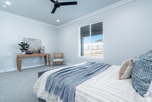 carpeted bedroom with baseboards, ornamental molding, ceiling fan, and recessed lighting