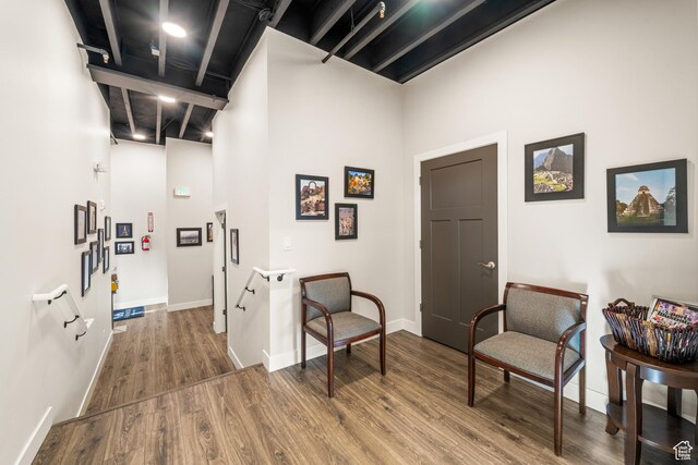 4554 Forestdale Dr N # 32, Park City, UT 84098 - hallway featuring wood-type flooring and a towering ceiling