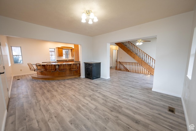 interior space with hardwood / wood-style floors and a chandelier