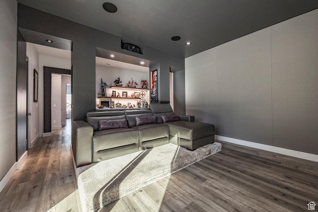 home theater featuring hardwood / wood-style flooring