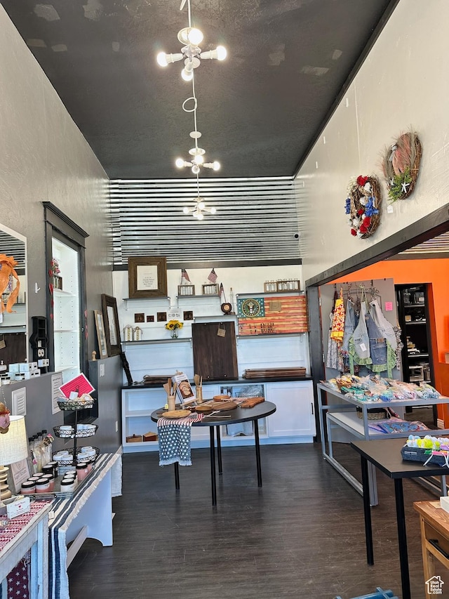 45 W Main St, Moroni, UT 84646 - dining space featuring dark hardwood / wood-style floors and an inviting chandelier