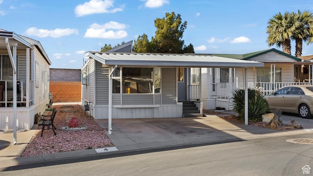 1160 E Telegraph St Unit 4, Washington, UT 84780 - view of front of house featuring a porch