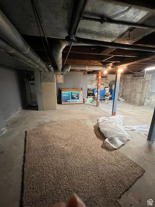 340 Jefferson St, Montpelier, ID 83254 - unfinished basement featuring heating unit