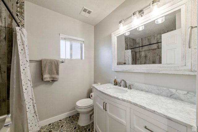 55 E 700 S Unit 1, St George, UT 84770 - bathroom featuring tile patterned flooring, vanity, toilet, and curtained shower