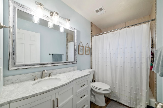 55 E 700 S Unit 1, St George, UT 84770 - bathroom featuring vanity, toilet, and walk in shower