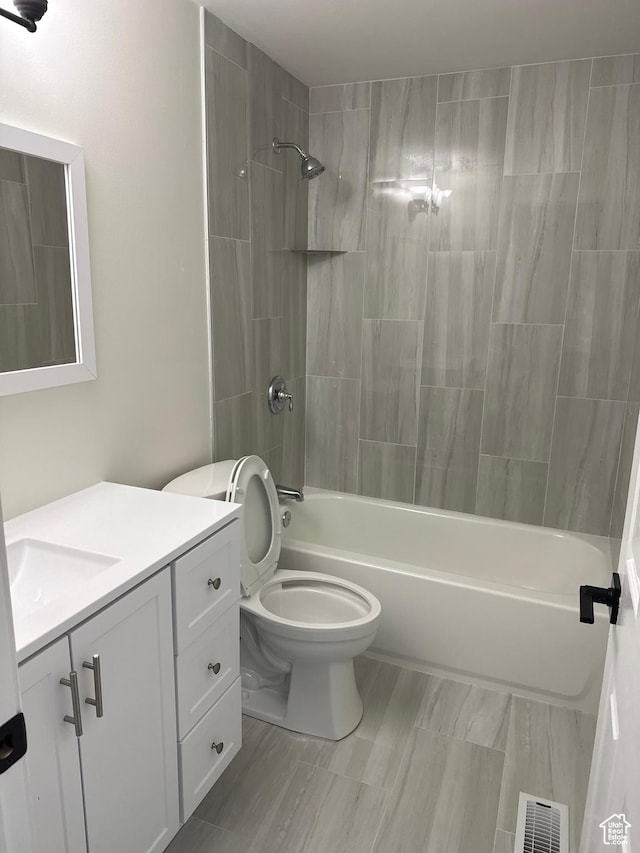 3671 S 2200 W Unit 1, West Valley City, UT 84119 - full bathroom with washtub / shower combination, vanity, and toilet