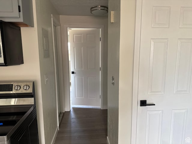3671 S 2200 W Unit 1, West Valley City, UT 84119 - hall with dark hardwood / wood-style flooring, a textured ceiling, and electric panel