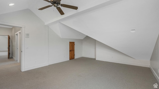 bonus room with carpet, ceiling fan, and lofted ceiling