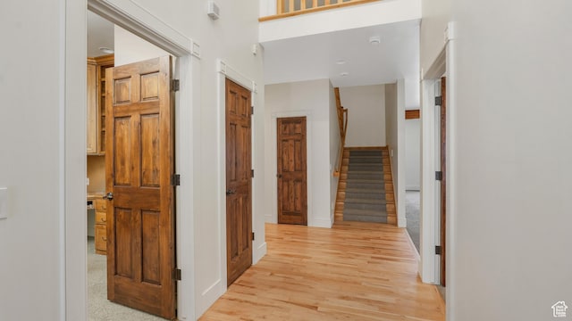 corridor featuring light hardwood / wood-style floors