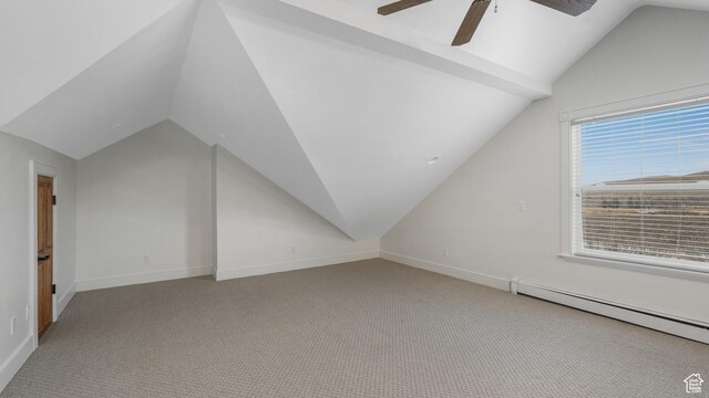bonus room featuring baseboard heating, light carpet, and vaulted ceiling