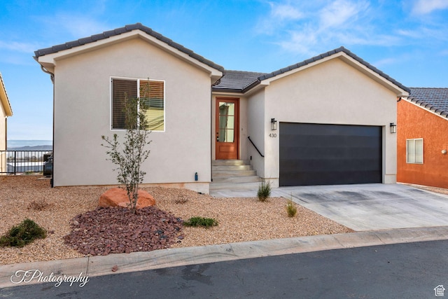 single story home with a garage