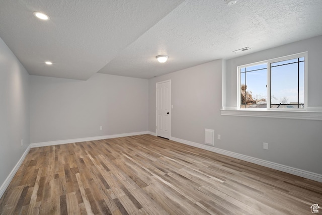 6190 W 5950 S, Hooper, UT 84315 - interior space featuring a textured ceiling and light hardwood / wood-style flooring