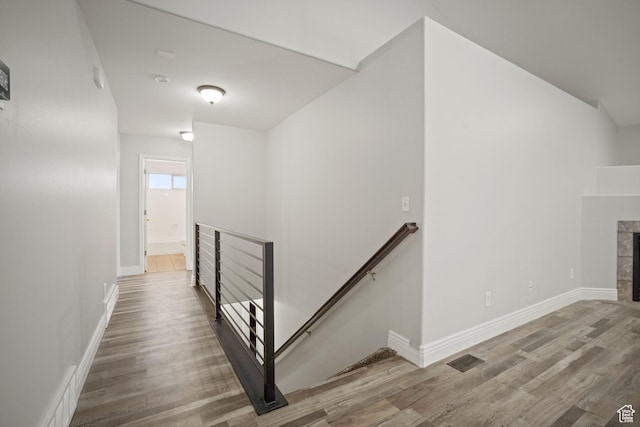 6190 W 5950 S, Hooper, UT 84315 - stairs featuring a tile fireplace and hardwood / wood-style floors