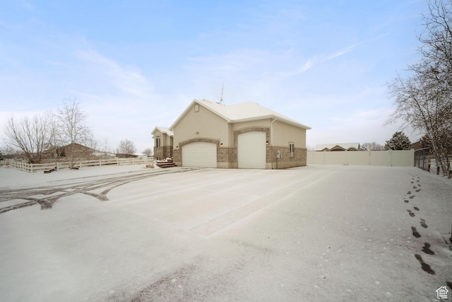 6190 W 5950 S, Hooper, UT 84315 - view of side of property with a garage