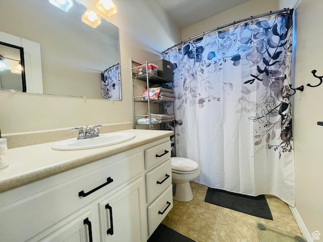 908 W Timpie Rd S, Tooele, UT 84074 - full bath featuring vanity, toilet, tile patterned floors, and a shower with shower curtain