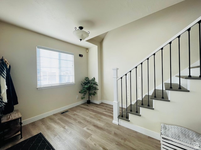 908 W Timpie Rd S, Tooele, UT 84074 - stairway with wood finished floors and baseboards