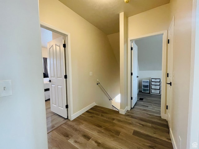 908 W Timpie Rd S, Tooele, UT 84074 - hallway with an upstairs landing, wood finished floors, and baseboards