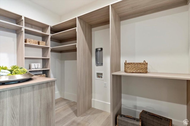 1316 N Gold Mountain Cir, Heber City, UT 84032 - walk in closet with light wood finished floors