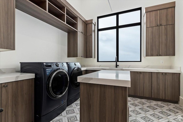 1316 N Gold Mountain Cir, Heber City, UT 84032 - laundry room featuring cabinet space, washing machine and dryer, and light flooring