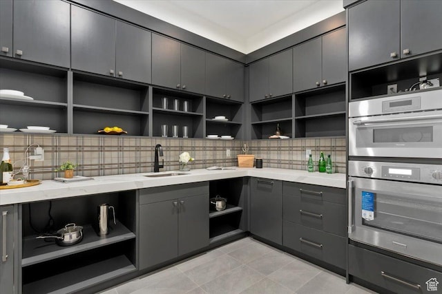 1316 N Gold Mountain Cir, Heber City, UT 84032 - kitchen featuring open shelves, gray cabinetry, a sink, and tasteful backsplash