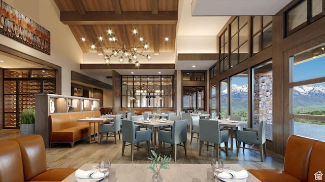 1316 N Gold Mountain Cir, Heber City, UT 84032 - dining space featuring high vaulted ceiling, wood finished floors, a chandelier, beam ceiling, and a mountain view