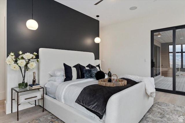 1316 N Gold Mountain Cir, Heber City, UT 84032 - bedroom featuring wood finished floors and access to exterior
