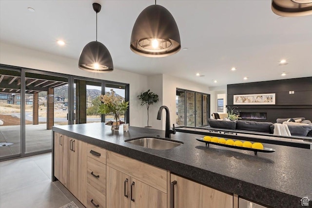1316 N Gold Mountain Cir, Heber City, UT 84032 - kitchen featuring light brown cabinets, hanging light fixtures, recessed lighting, light tile patterned floors, and open floor plan