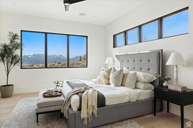 1316 N Gold Mountain Cir, Heber City, UT 84032 - bedroom with wood finished floors and a mountain view
