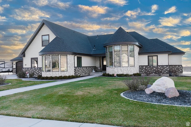 743 N 1100 E, Nephi, UT 84648 - view of front of property with stone siding, roof with shingles, a front yard, and stucco siding