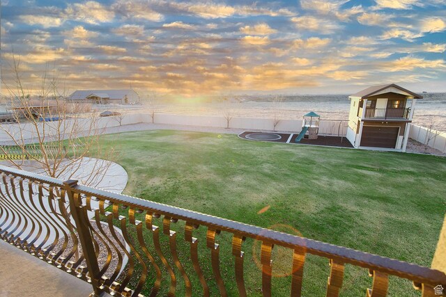 743 N 1100 E, Nephi, UT 84648 - yard at dusk with a fenced backyard and a water view